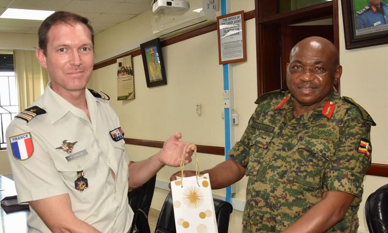 Maj. Gen. Jackson Bakasumba with Lt. Col. Yam Chollet