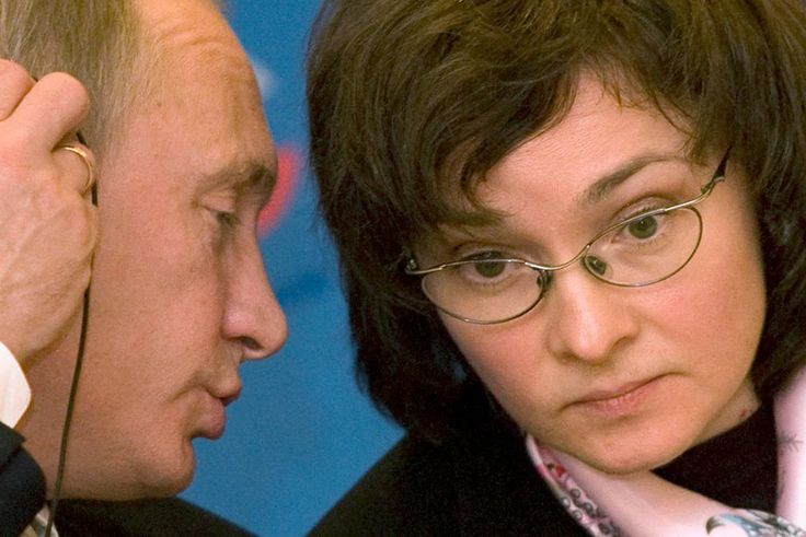 Russia's President Vladimir Putin and Russian central bank governor Elvira Nabiullina in a 2008 photo. At the time, Putin was Russia's Prime Minister and Nabiullina was the country's economy minister.Sergei Karpukhin/Reuters