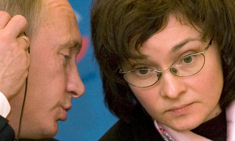 Russia's President Vladimir Putin and Russian central bank governor Elvira Nabiullina in a 2008 photo. At the time, Putin was Russia's Prime Minister and Nabiullina was the country's economy minister.Sergei Karpukhin/Reuters