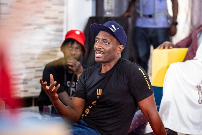 Nabwiso directing at a set