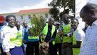 Kyakulya (centre) planting a tree to mark Human Rights Defenders Day. Photos by Ambrose Watanda