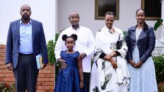 Gen Kainerugaba, President Museveni with his granddaughter, Janet and Charlotte