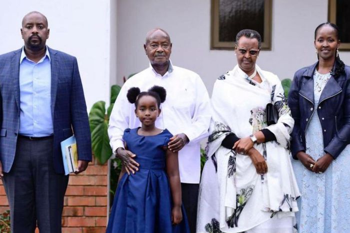 Gen Kainerugaba, President Museveni with his granddaughter, Janet and Charlotte