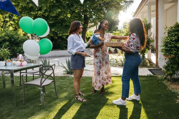 Newborn being gifted