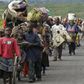 Refugees fleeing the DRC during fighting between rebels and government troops