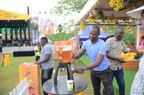 Consumers enjoying the new Bell Draught beer at Roast and Rhyme Nyam on the Nile in Jinja