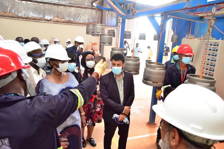 Hon Alice Kaboyo touring the cylinder factory