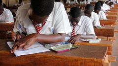 Candidates sitting their UNEB papers