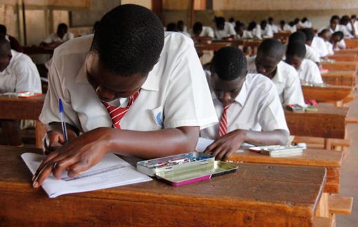 Candidates sitting their UNEB papers