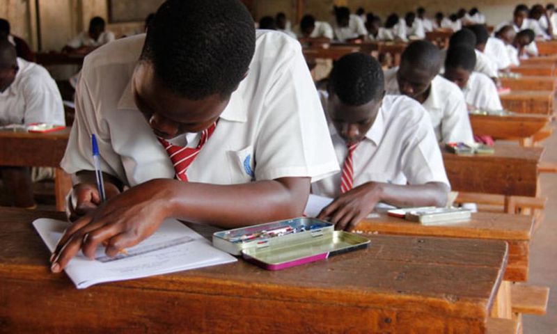 Candidates sitting their UNEB papers