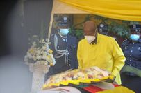 Museveni lays a wreath on the casket of Hon Aleper