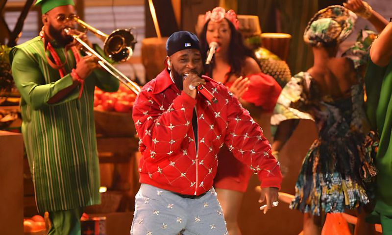 Nigerian singer Burna Boy performs on stage during the 66th Annual Grammy Awards at the Crypto.com Arena in Los Angeles on February 4, 2024. (Photo by Valerie Macon / AFP) (Photo by VALERIE MACON/AFP via Getty Images)