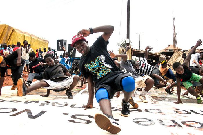 Kaweesi teaching a free class on the streets of Mbiko, Buikwe district
