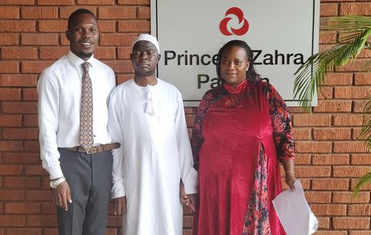 Hon Muhammad Ssegirinya (C) upon being discharged from Aga Khan hospital