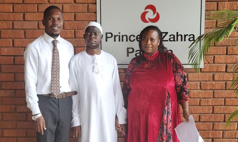 Hon Muhammad Ssegirinya (C) upon being discharged from Aga Khan hospital