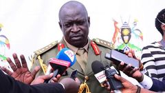 Gen Peter Elwelu speaking to the press