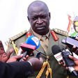 Gen Peter Elwelu speaking to the press