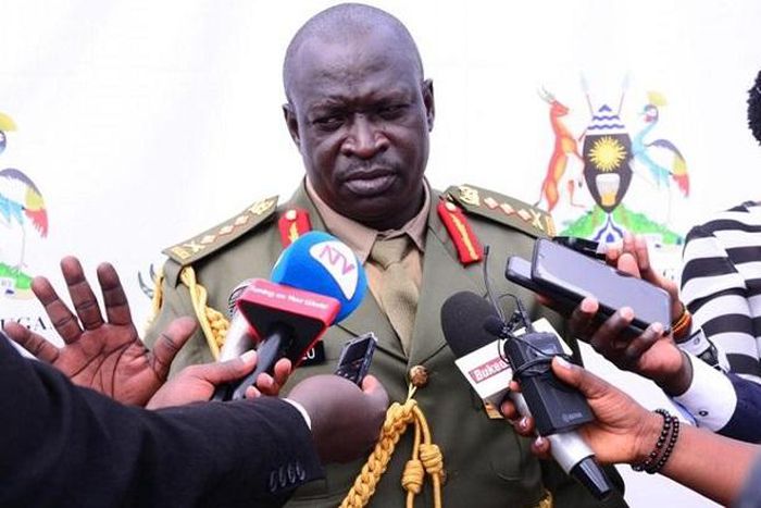 Gen Peter Elwelu speaking to the press