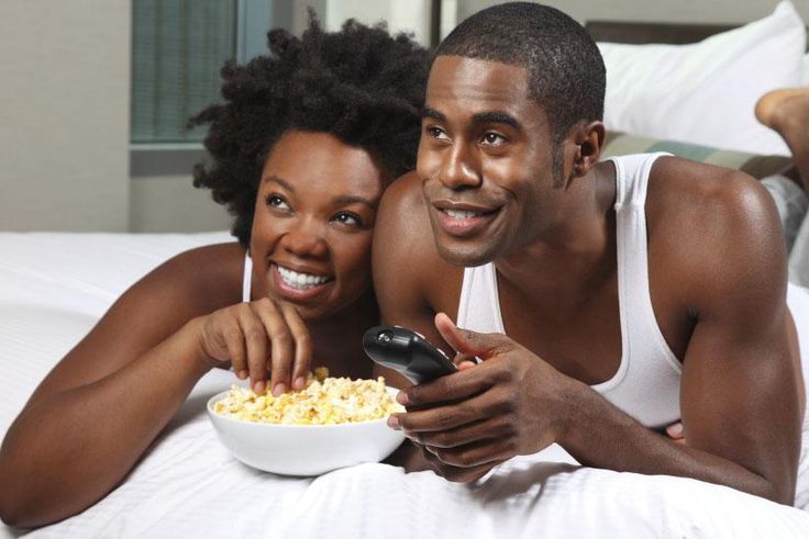 Black couple watching a movie