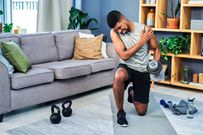 Man experiencing post work out pain