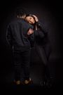 Couple facing away from each other/Courtesy/Alexis