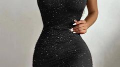 Black woman wearing a black dress [Walmart]