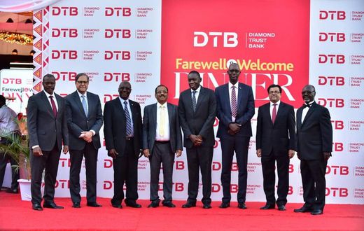 BOU, DTB Board Members bid Farewell to Outgoing MD, Varghese Thambi(Fourth Left) and officially welcomed New MD Godfrey Sebaana (Top left) during a Farewell Dinner at Serena Hotel Kampala.