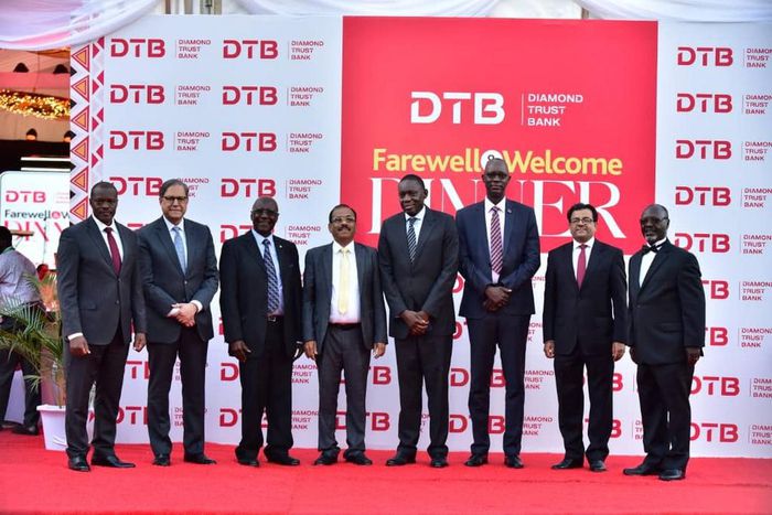 BOU, DTB Board Members bid Farewell to Outgoing MD, Varghese Thambi(Fourth Left) and officially welcomed New MD Godfrey Sebaana (Top left) during a Farewell Dinner at Serena Hotel Kampala.