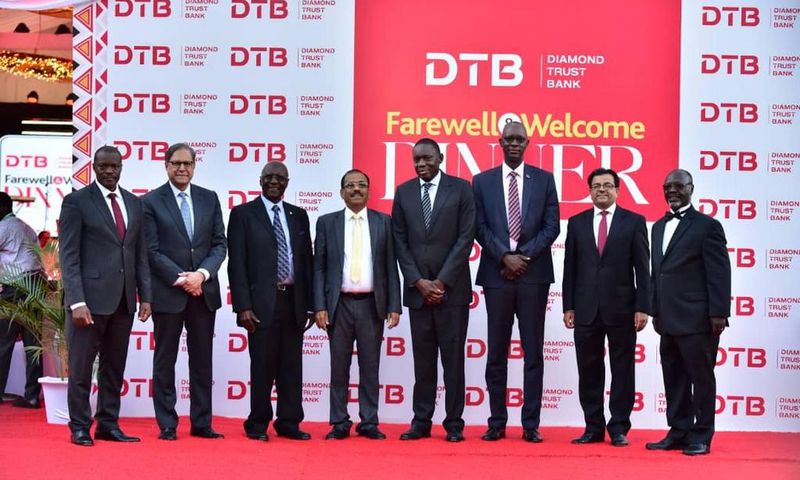 BOU, DTB Board Members bid Farewell to Outgoing MD, Varghese Thambi(Fourth Left) and officially welcomed New MD Godfrey Sebaana (Top left) during a Farewell Dinner at Serena Hotel Kampala.