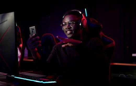 Young man in front of gaming console/Courtesy/Ameyaw Debrah Media