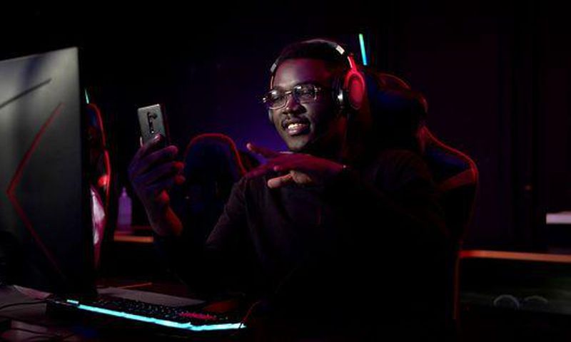 Young man in front of gaming console/Courtesy/Ameyaw Debrah Media