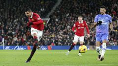 Manchester United midfielder Casemiro (18) shoots at goal during the Premier League match between Manchester United and Bournemouth at Old Trafford on January 3, 2023.