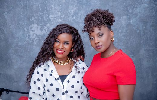 Juliana (L) and Iryn Namubiru (R) pose for photo