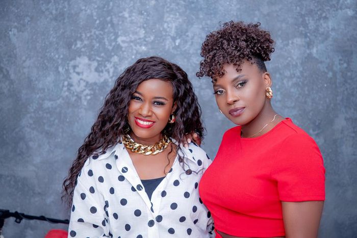 Juliana (L) and Iryn Namubiru (R) pose for photo