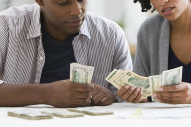 Couple counting money