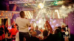 The night pulsed with energy as a vibrant crowd gathered for an evening of music, food, and socializing