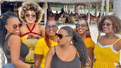 Diana Nabatanzi and her girls in Zanzibar