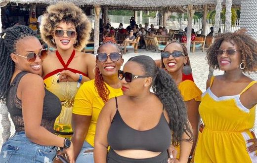 Diana Nabatanzi and her girls in Zanzibar