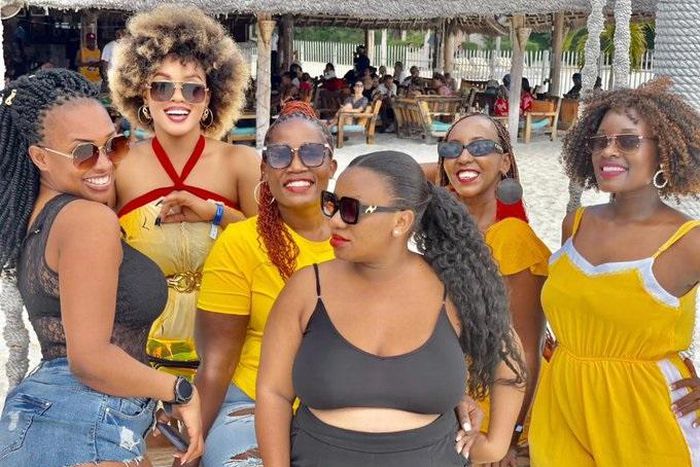 Diana Nabatanzi and her girls in Zanzibar