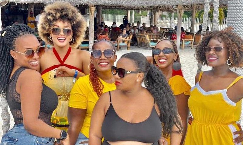 Diana Nabatanzi and her girls in Zanzibar