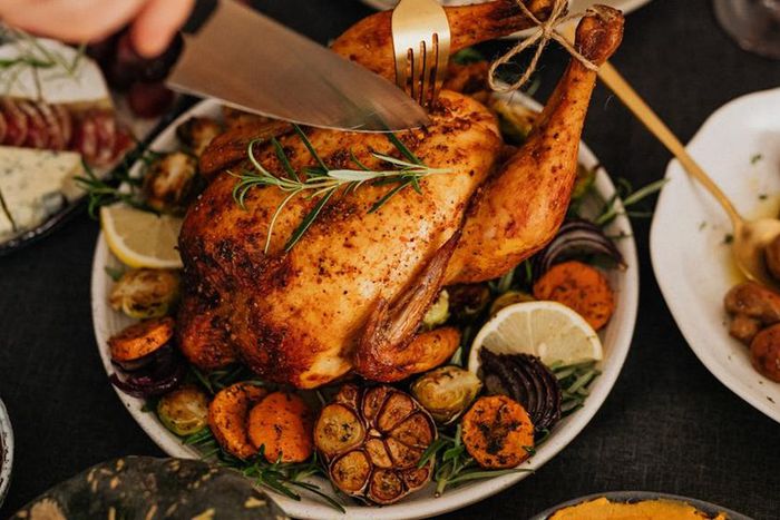 Easy DIY recipe for making whole stuffed chicken at home [Image Credit: Karolina Grabowska]