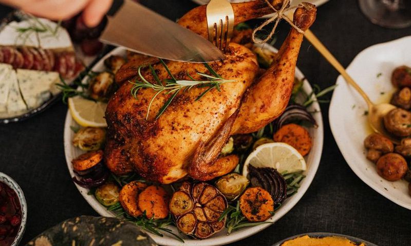 Easy DIY recipe for making whole stuffed chicken at home [Image Credit: Karolina Grabowska]