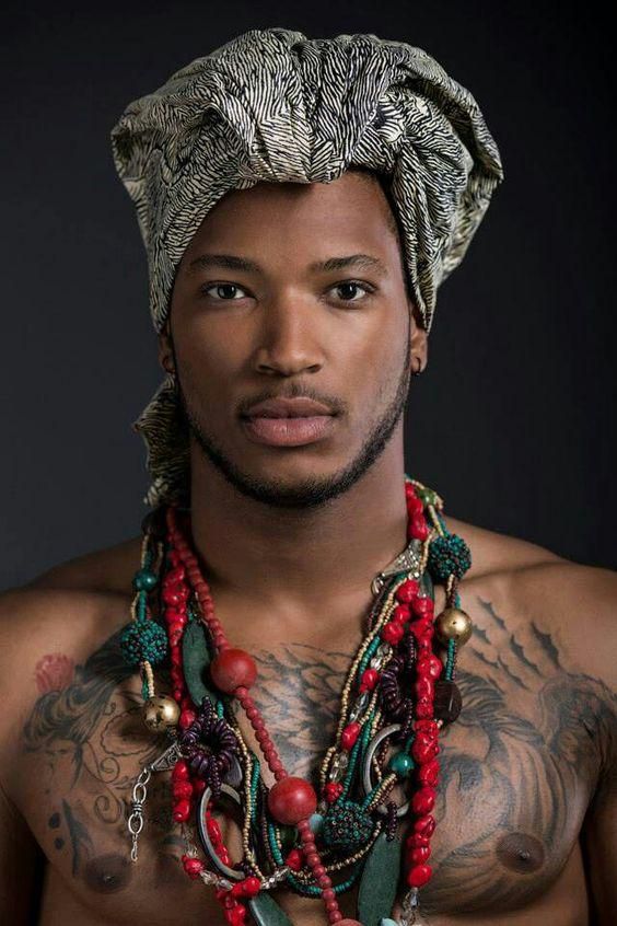 Man wearing a headwrap and accessories/Courtesy