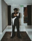 Ykee Benda springs like black panther in a stylish casual loose suit/Instagram