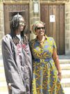 Besigye's son Anselm posing with his mother after his graduation in Chicago