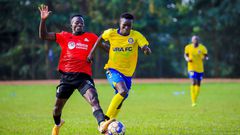 Ojera vies for the ball with Vipers FC player