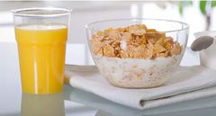 Cereal + milk and orange juice