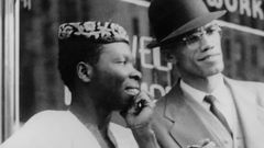 Babatunde Olatunji attending an event in Harlem with Malcolm X to mark Nigeria's independence from the UK on October 1, 1960