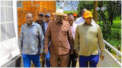ODM party leader Raila Odinga with Vihiga Governor Wilber Otichillo and Senator Godfrey Osotsi during the Senator's thanksgiving ceremony at Chavakali High School.