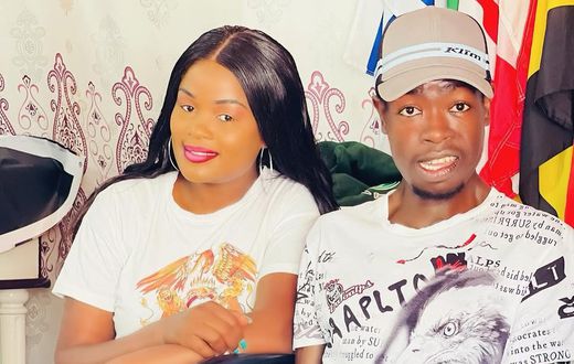 A past image of late footballer Ezekiel Otuoma with his wife Racheal Otuoma